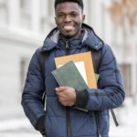 portrait-male-student-with-books